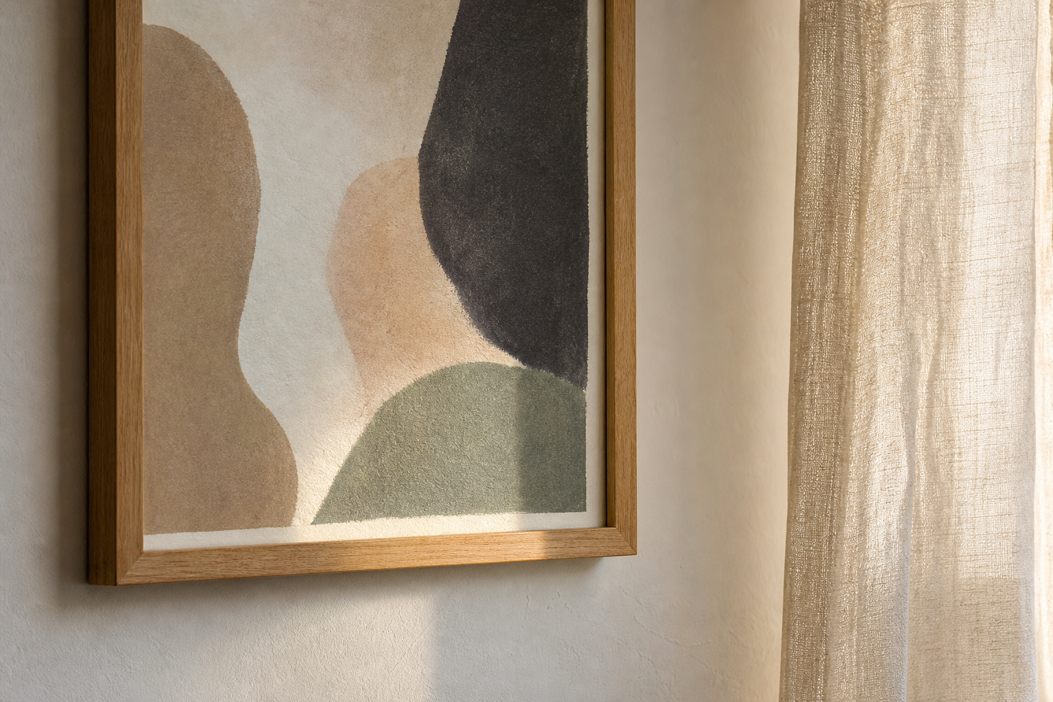 Close-up of wood frame and textured abstract art in a living room