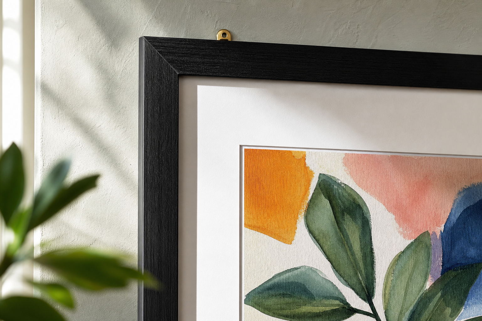Close-up of black wood frame and mounted illustration print