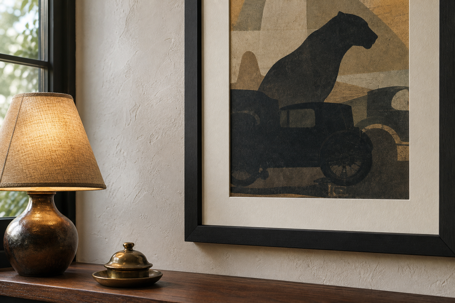 Close-up of dark frame and moody art wall in warm lighting