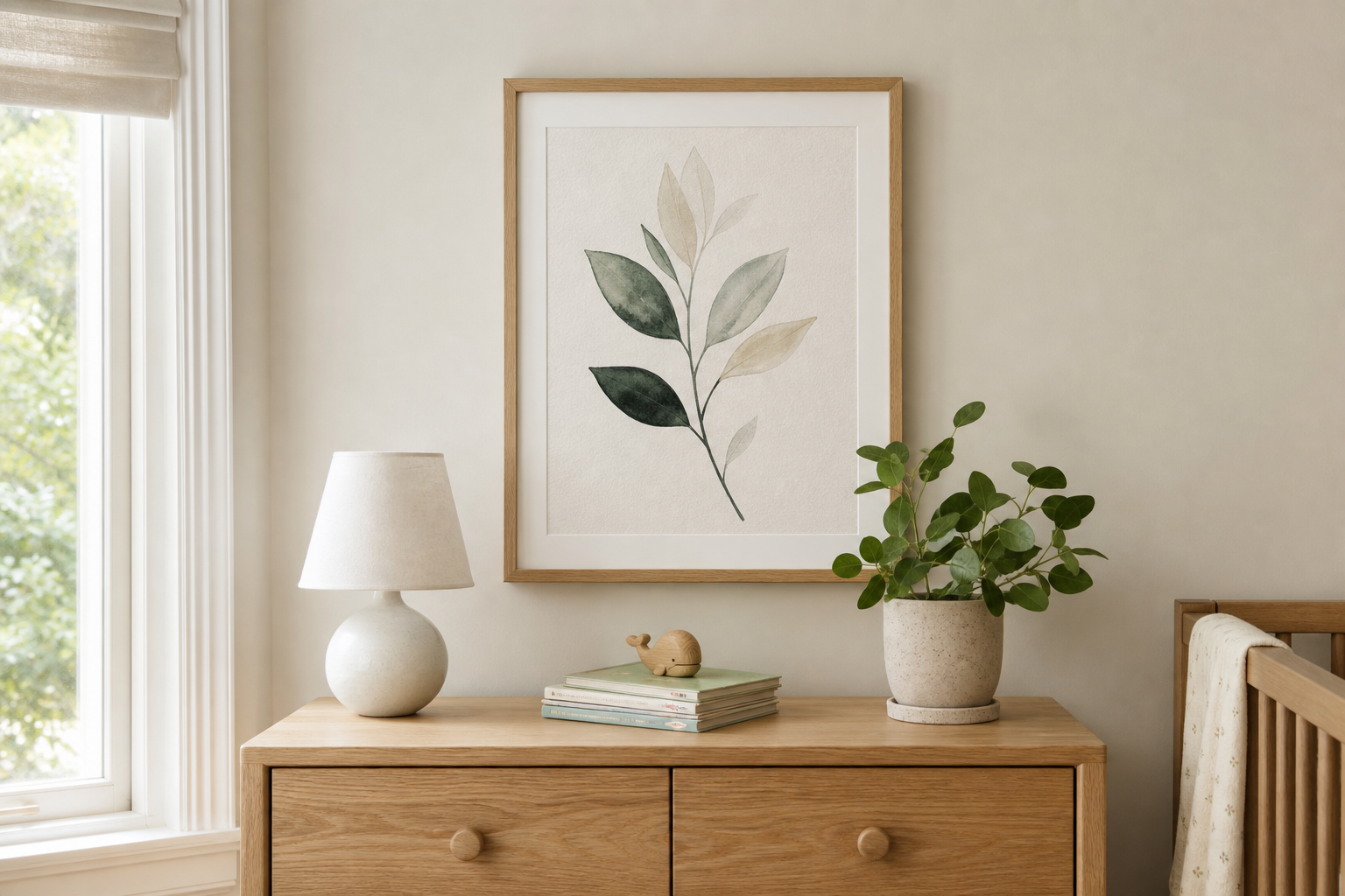 Framed children's wall art above oak dresser in soft daylight
