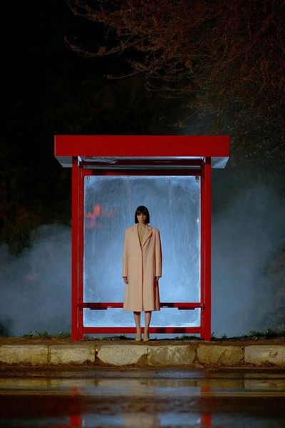 Woman at Bus Stop