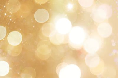 Shiny gold festive bokeh background.