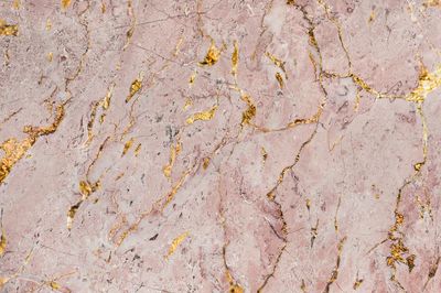 Pink marble rock textured background. poster