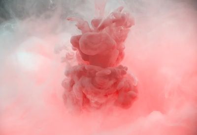 Acryllic color dissolving in water.