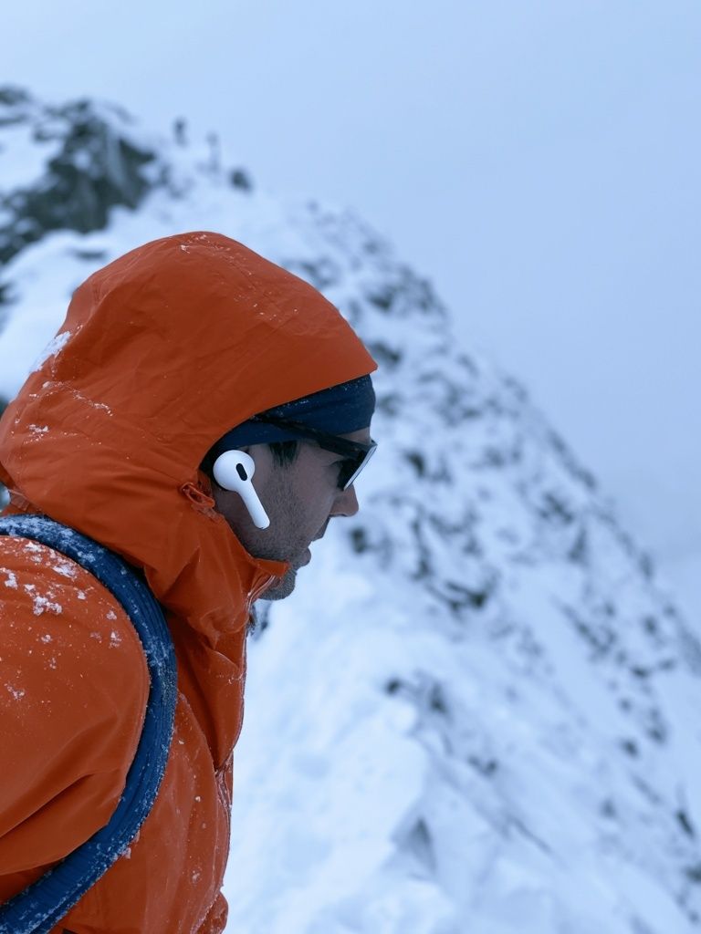 Alpine Climber in Orange Jacket Poster. poster — photography art