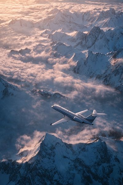 Airplane Over Snowy Mountains — Photography Print. poster