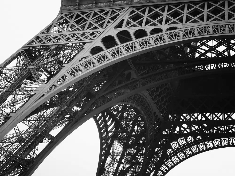 Bottom Eiffel Tower cloudy day. poster detail