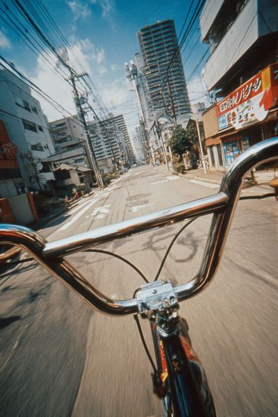Bicycle Ride Through City Streets Poster. poster