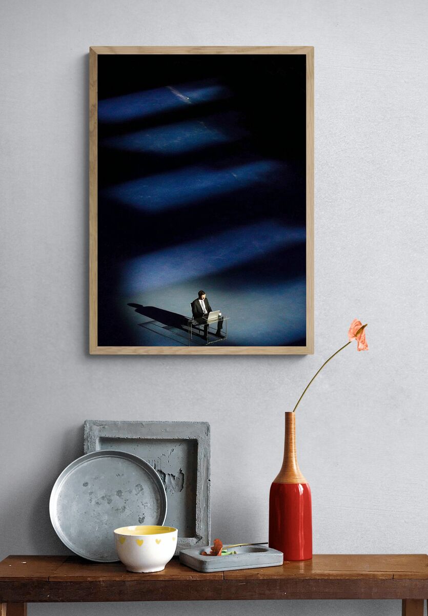 Businessman in Spotlight — Photography Print. — room view 3