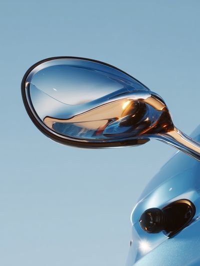 Blue Sports Car Mirror Photography Poster. poster