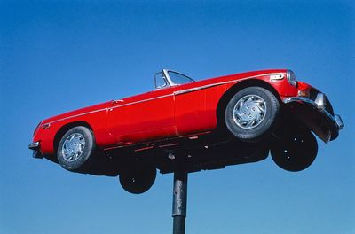 Red Convertible Car — Vintage Print. poster