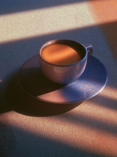 Sunlit Coffee Cup Photography Poster.