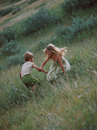 Children Playing in Meadow