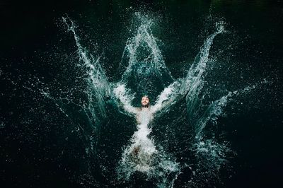 Man Diving into Water — Photography Print. poster