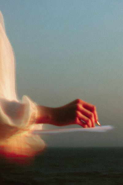 Ethereal Hand Over Water