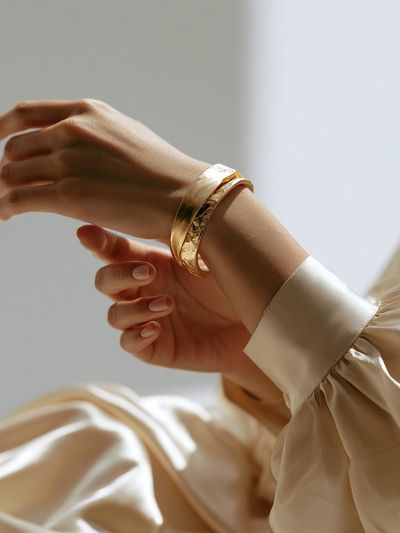 Elegant Gold Bracelet Photography Poster. poster