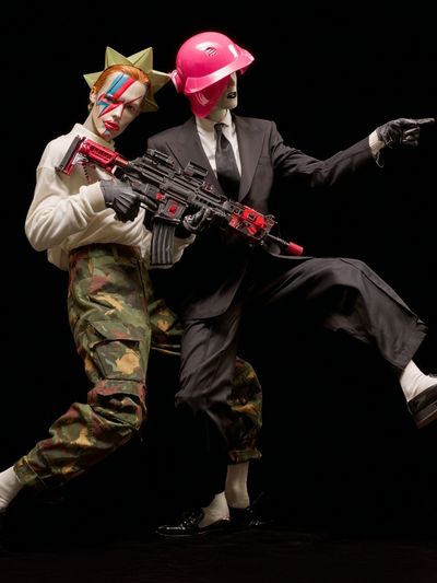 Stylish Duo with Gun — Contemporary Print. poster print
