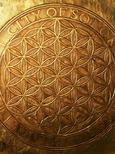 City of Sol Golden Emblem Poster.