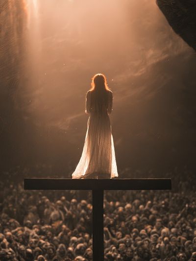 Solitary Figure in Light Poster. poster