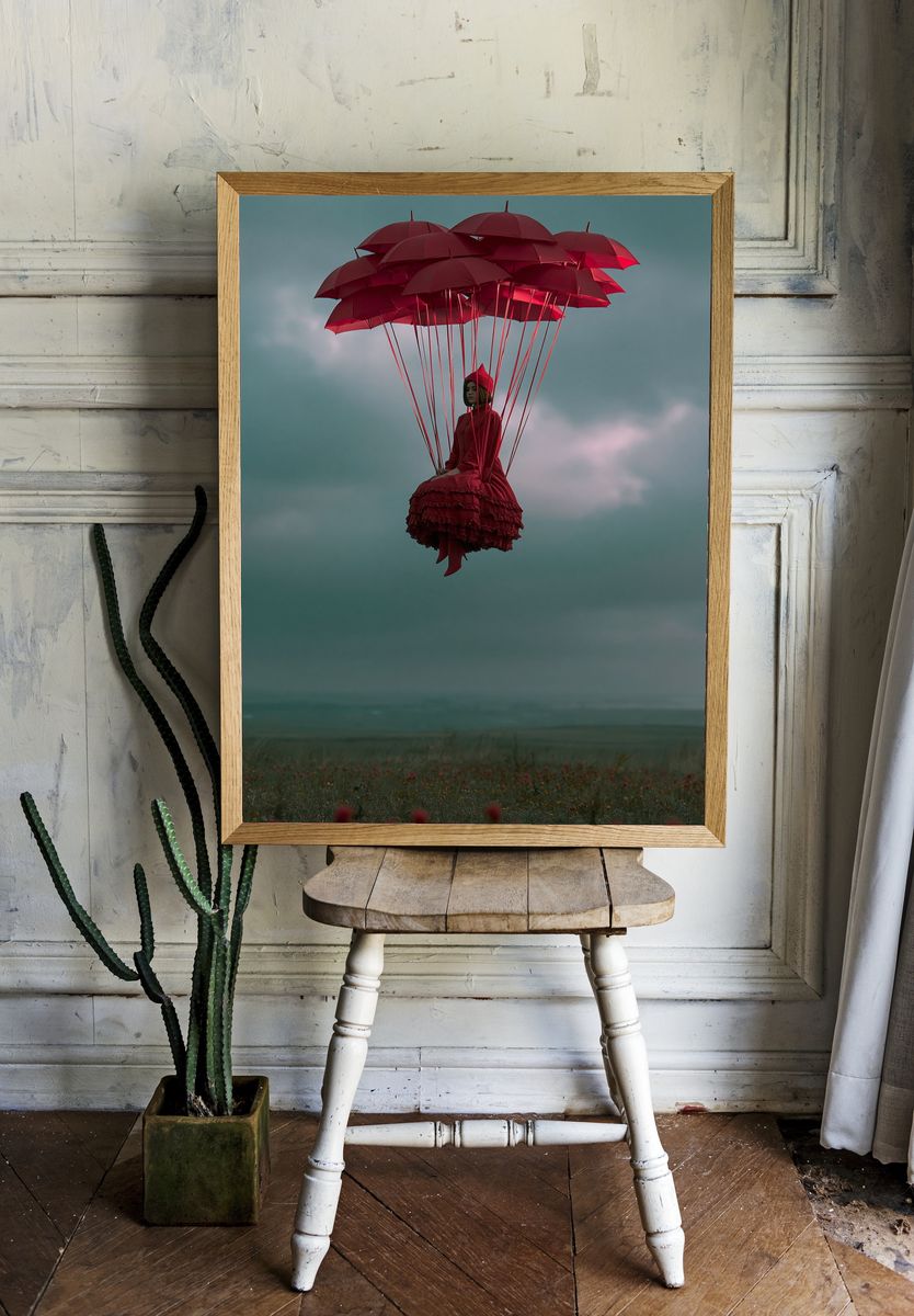 Floating Red Umbrellas Surreal Print. — room view 1