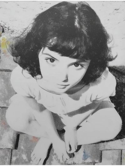 Girl on Cobblestones Fine-Art Print. poster print