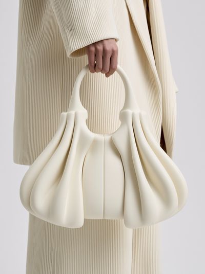 Cream Sculptural Handbag Fashion Poster. poster