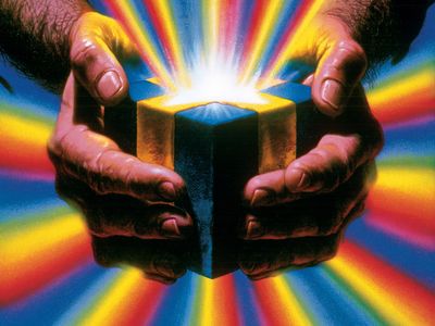 Hands Holding Light Cube Poster.