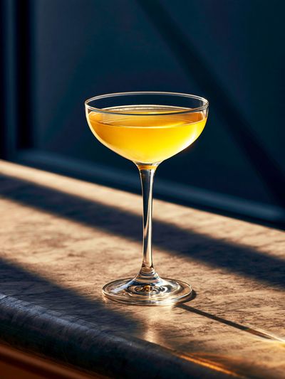 Golden Cocktail Glass Photography Poster. poster