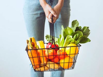 Shopping basket full fruits vegetables. poster print