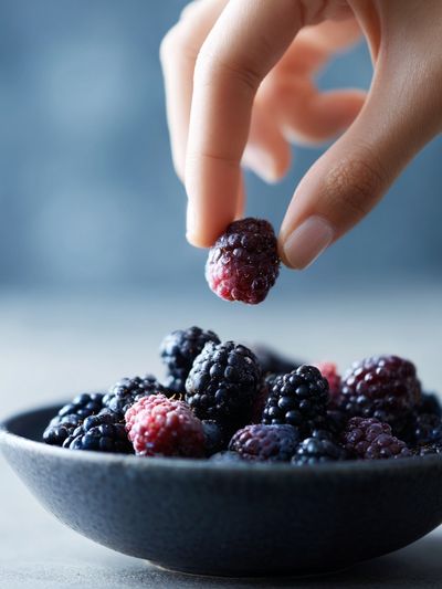 Blackberries in Hand Photography Poster. poster print