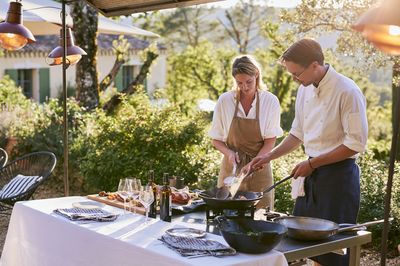 Outdoor Chef Cooking Scene Poster. poster print