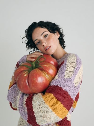 Woman Holding Tomato
