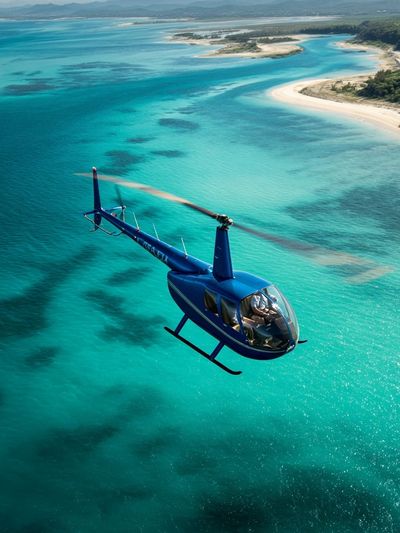 Helicopter Over Turquoise Coast Poster. poster print