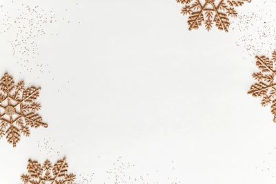 Festive golden snowflakes frame design. poster print