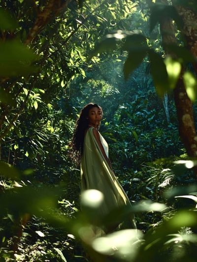 Woman in Lush Jungle — Photography Print. poster print