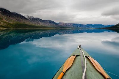 Kayaking on a Serene Lake Poster