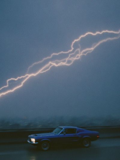Lightning Strike with Classic Car Poster. poster print
