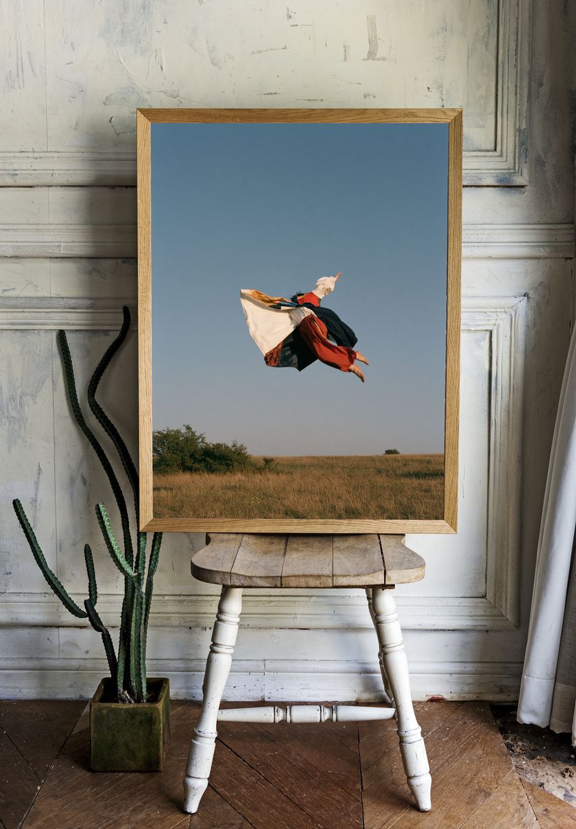 Leaping Figure in Sky Photography Poster. — room view 1