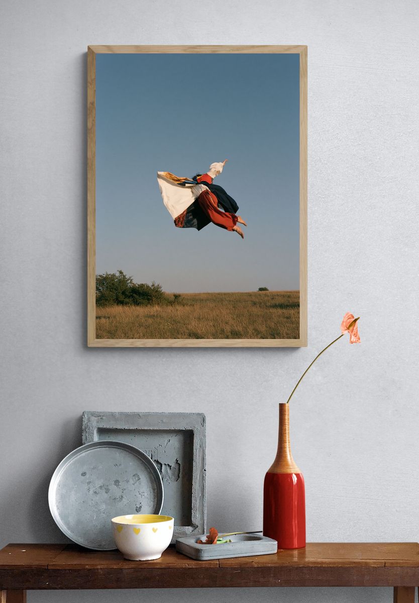 Leaping Figure in Sky Photography Poster. — room view 3