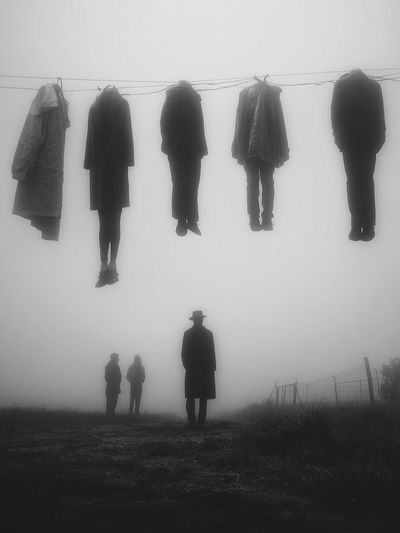 Mysterious Figures in Fog
