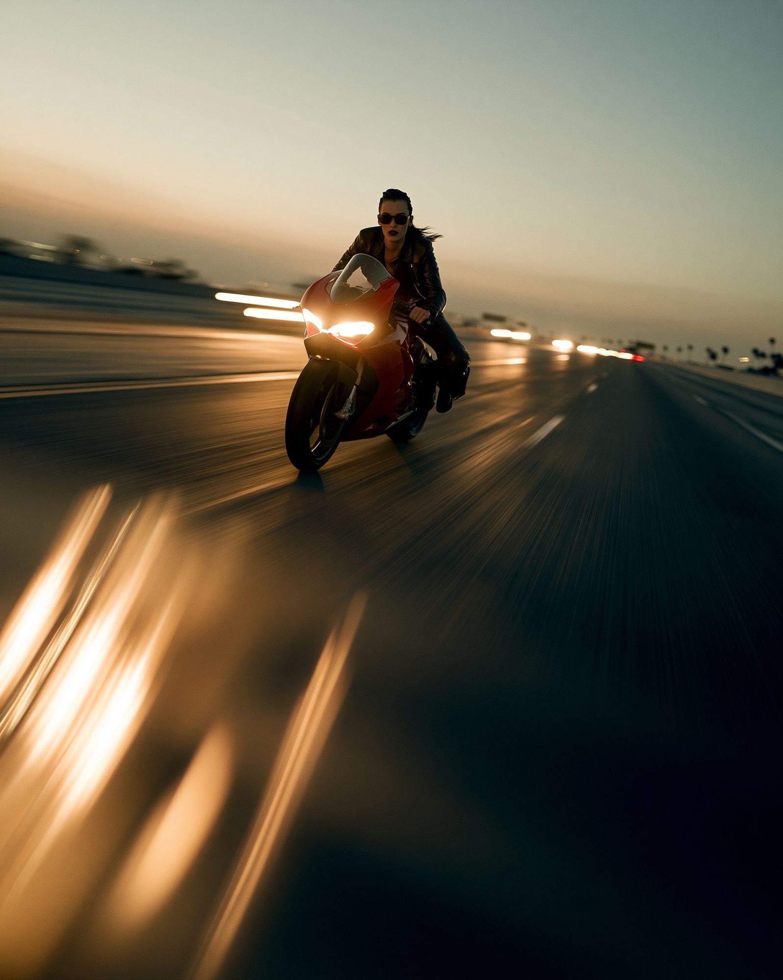 Motorcycle Rider at Sunset Photography Poster. poster detail