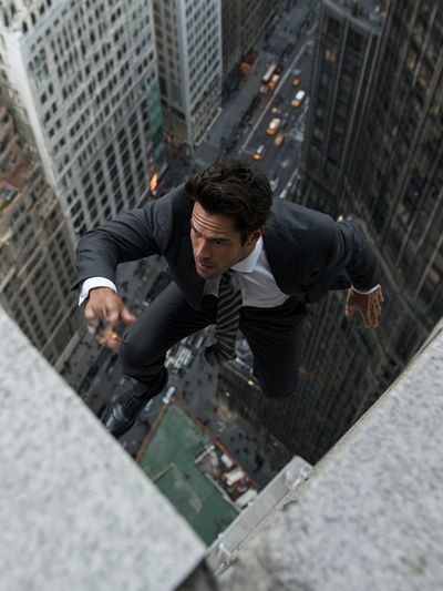 Man Scaling Skyscraper Action Poster. poster