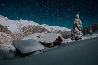 Snowy Mountain Cabin Night Poster