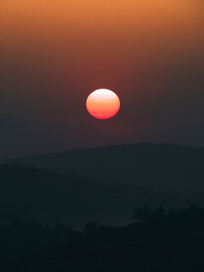 Sunset Over Misty Hills Print. poster