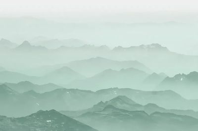 Green mountains background, misty landscape.