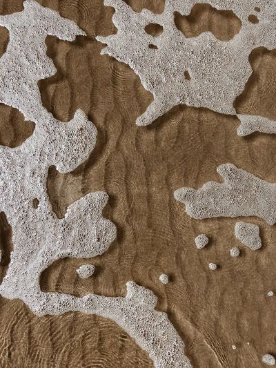 Shallow sea waters textured.