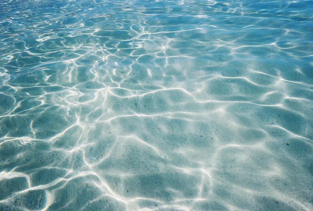Tropical blue sea water textured. poster detail