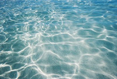 Tropical blue sea water textured.