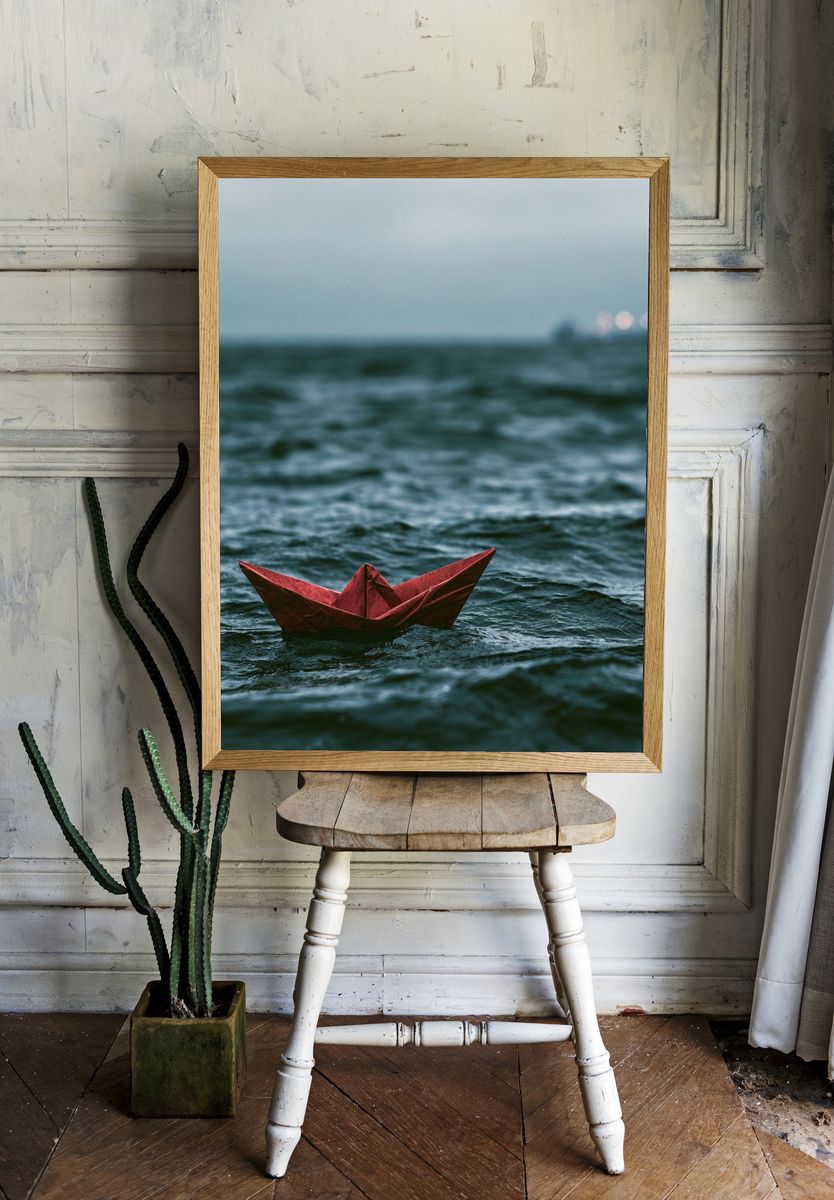 Red Paper Boat at Sea Photography Poster. — room view 1