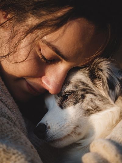 Woman Embracing Dog — Photography Print. poster